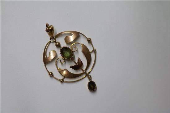 An Edwardian gold openwork pendant set amethyst and pearl, a peridot set pendant and a 15ct gold and turquoise heart pendant